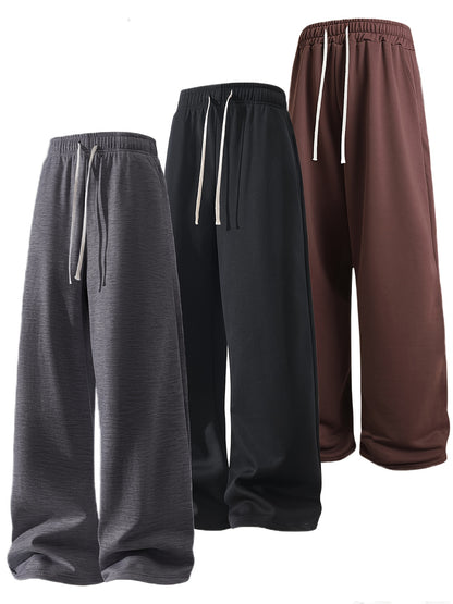 A Set of Three Solid Color Men'S Loose Straight-Leg Long Pants, Suitable for Spring And Autumn Fitness Activities - Made from Soft, Slightly Stretchy Knitted Fabric, Featuring a Drawstring Waist, Ideal for Outdoor Leisure And