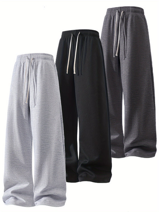 A Set of Three Solid Color Men'S Loose Straight-Leg Long Pants, Suitable for Spring And Autumn Fitness Activities - Made from Soft, Slightly Stretchy Knitted Fabric, Featuring a Drawstring Waist, Ideal for Outdoor Leisure And
