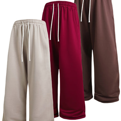 A Set of Three Solid Color Men'S Loose Straight-Leg Long Pants, Suitable for Spring And Autumn Fitness Activities - Made from Soft, Slightly Stretchy Knitted Fabric, Featuring a Drawstring Waist, Ideal for Outdoor Leisure And
